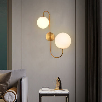 Modern Chic Milky White Globe Glass Shade Two-Light Indoor Wall Lamp in Aged Brass